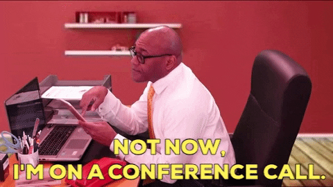 Man busy on a conference call
